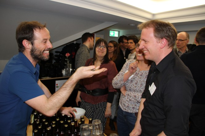 Attendees networking at GeoBeer #26 in Bern, photo 12