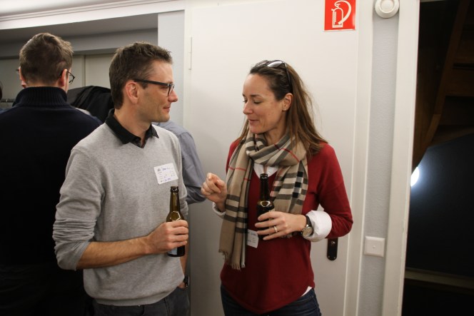 Attendees networking at GeoBeer #26 in Bern, photo 2