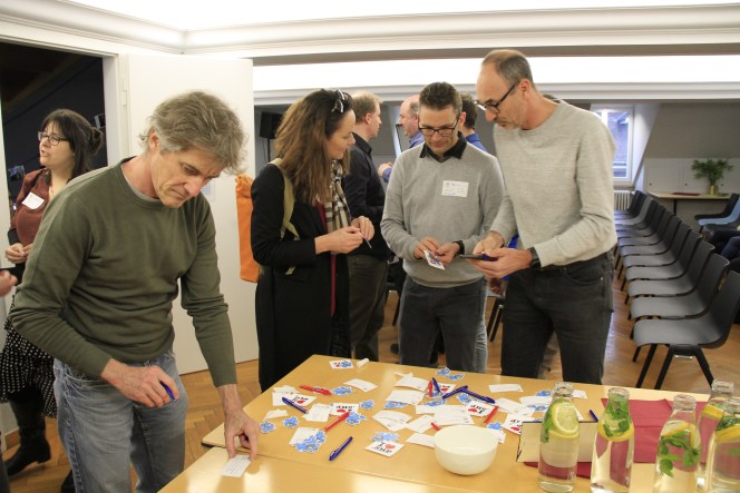 Attendees networking at GeoBeer #26 in Bern, photo 10